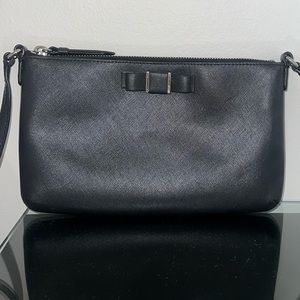 Coach Leather Crossbody Bag with Adjustable Strap and Bow Detailing